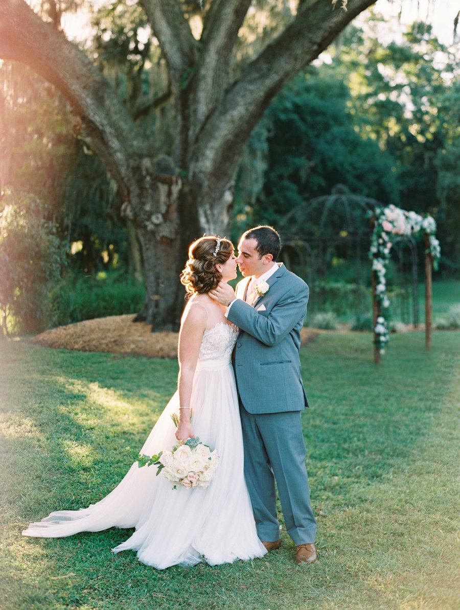 A Romantic Blush and White Rustic Florida Barn Wedding via TheELD.com