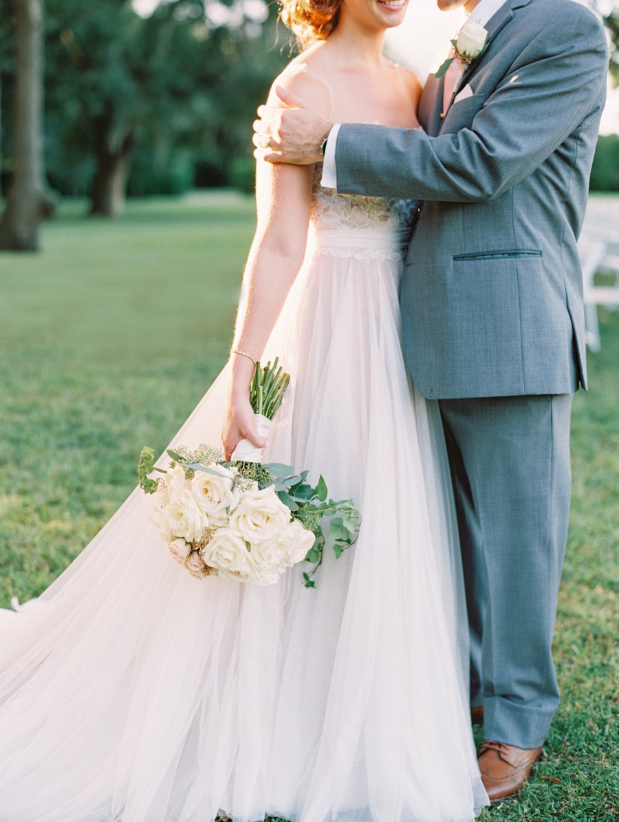 A Romantic Blush and White Rustic Florida Barn Wedding via TheELD.com