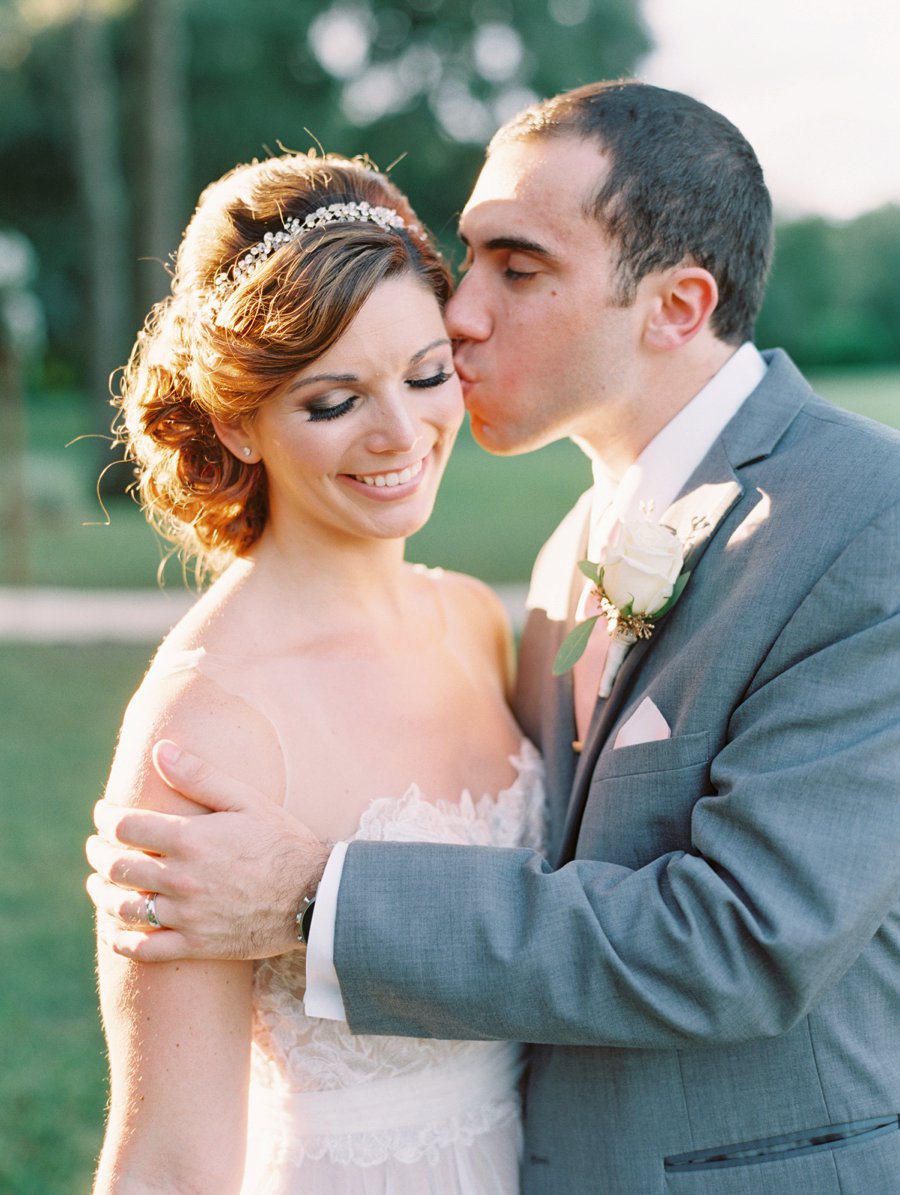 A Romantic Blush and White Rustic Florida Barn Wedding via TheELD.com