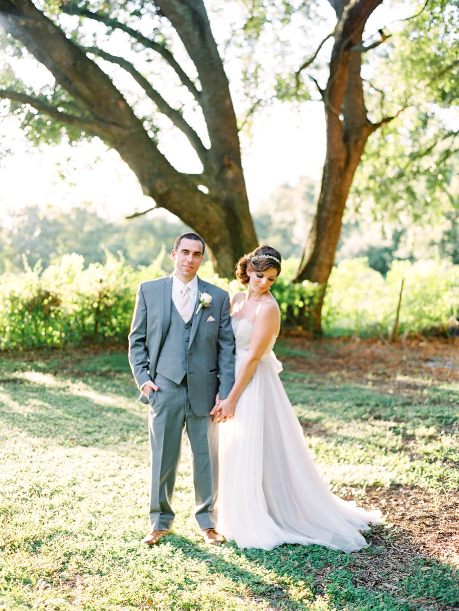 A Romantic Blush and White Rustic Florida Barn Wedding via TheELD.com