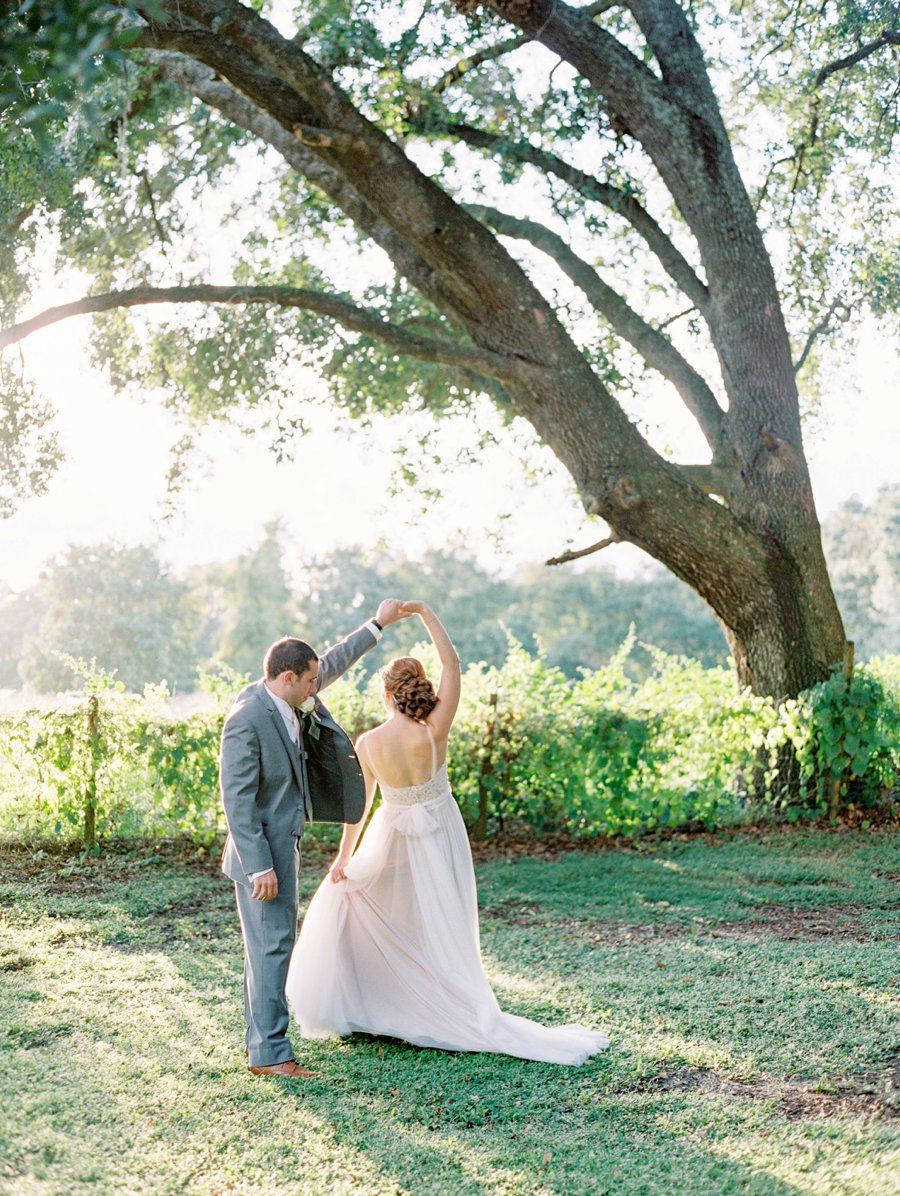 A Romantic Blush and White Rustic Florida Barn Wedding via TheELD.com