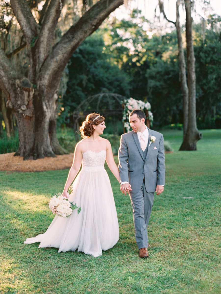 A Romantic Blush and White Rustic Florida Barn Wedding via TheELD.com