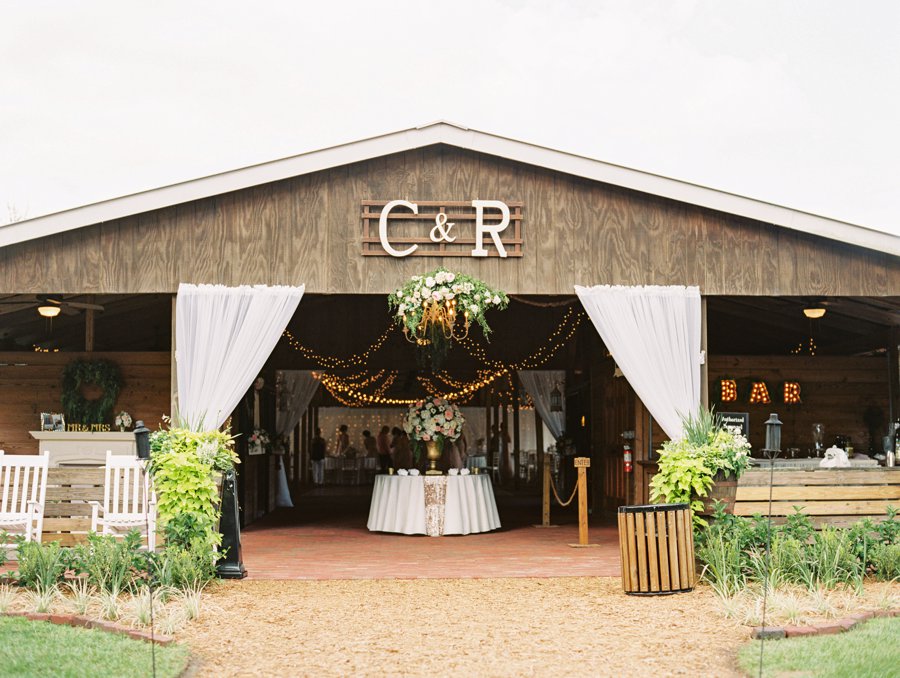 A Romantic Blush and White Rustic Florida Barn Wedding via TheELD.com