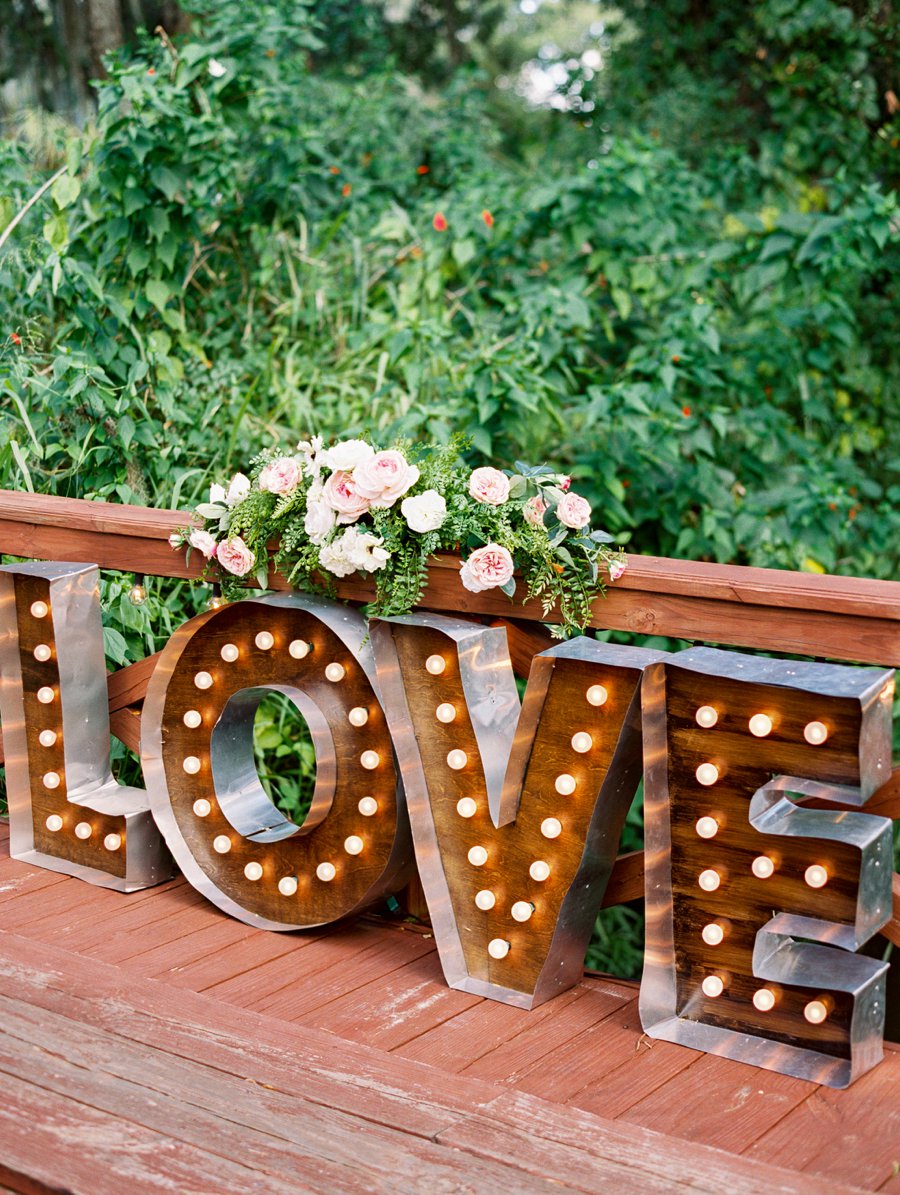 A Romantic Blush and White Rustic Florida Barn Wedding via TheELD.com