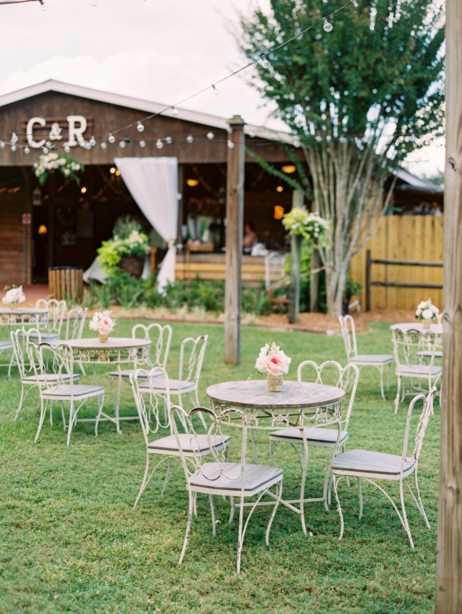 A Romantic Blush and White Rustic Florida Barn Wedding via TheELD.com