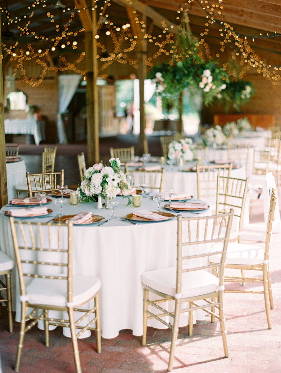 A Romantic Blush and White Rustic Florida Barn Wedding via TheELD.com