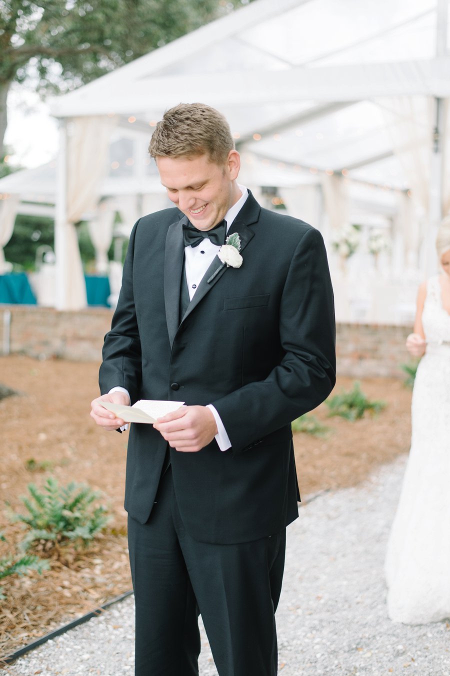 A White and Teal Southern Charleston Wedding via TheELD.com