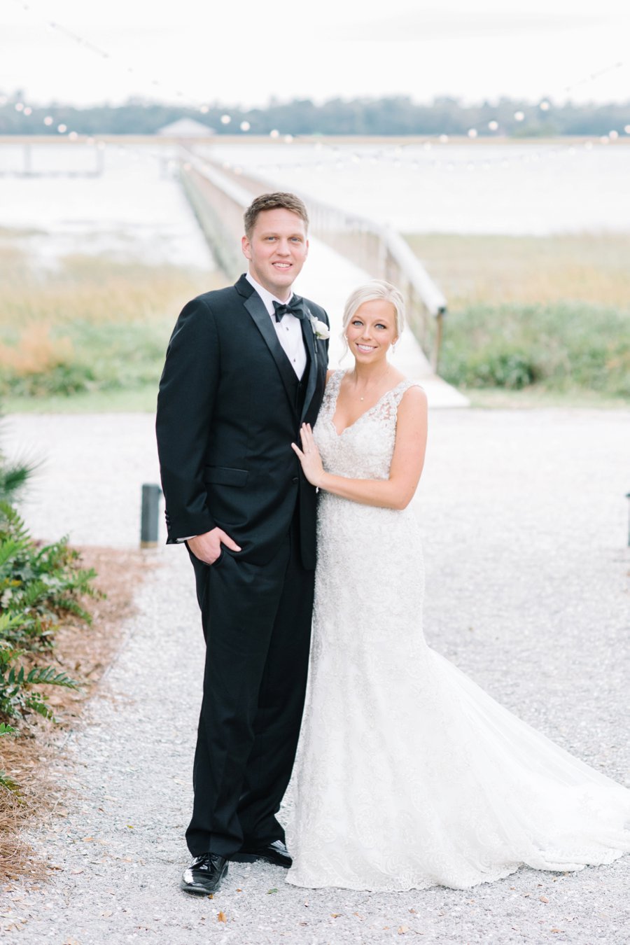 A White and Teal Southern Charleston Wedding via TheELD.com