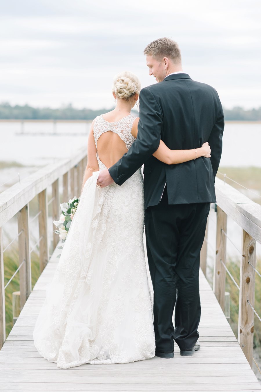 A White and Teal Southern Charleston Wedding via TheELD.com