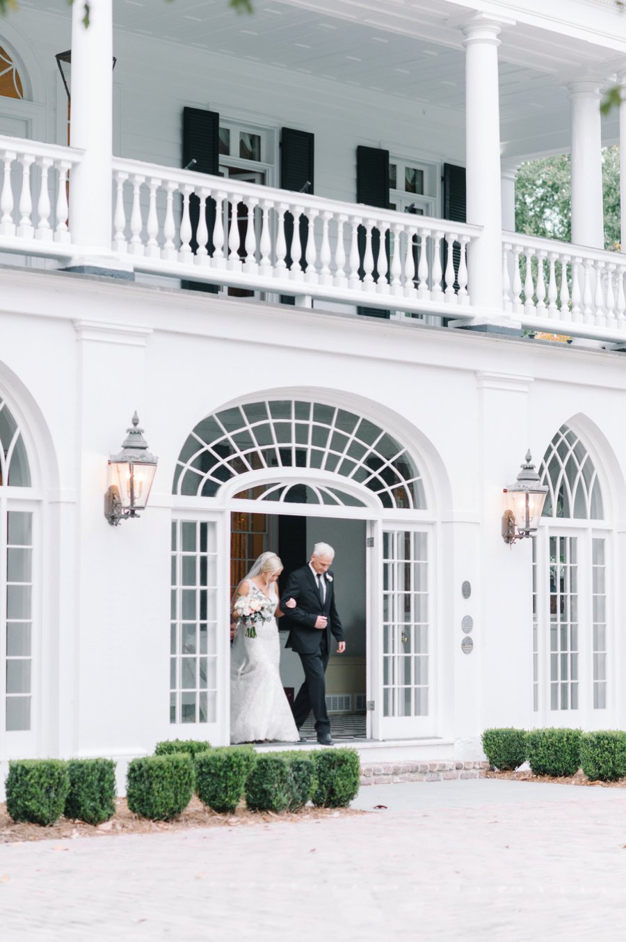 A White and Teal Southern Charleston Wedding via TheELD.com