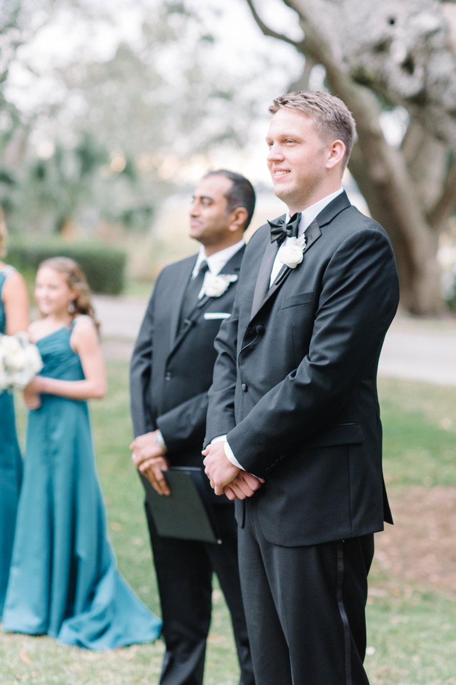 A White and Teal Southern Charleston Wedding via TheELD.com