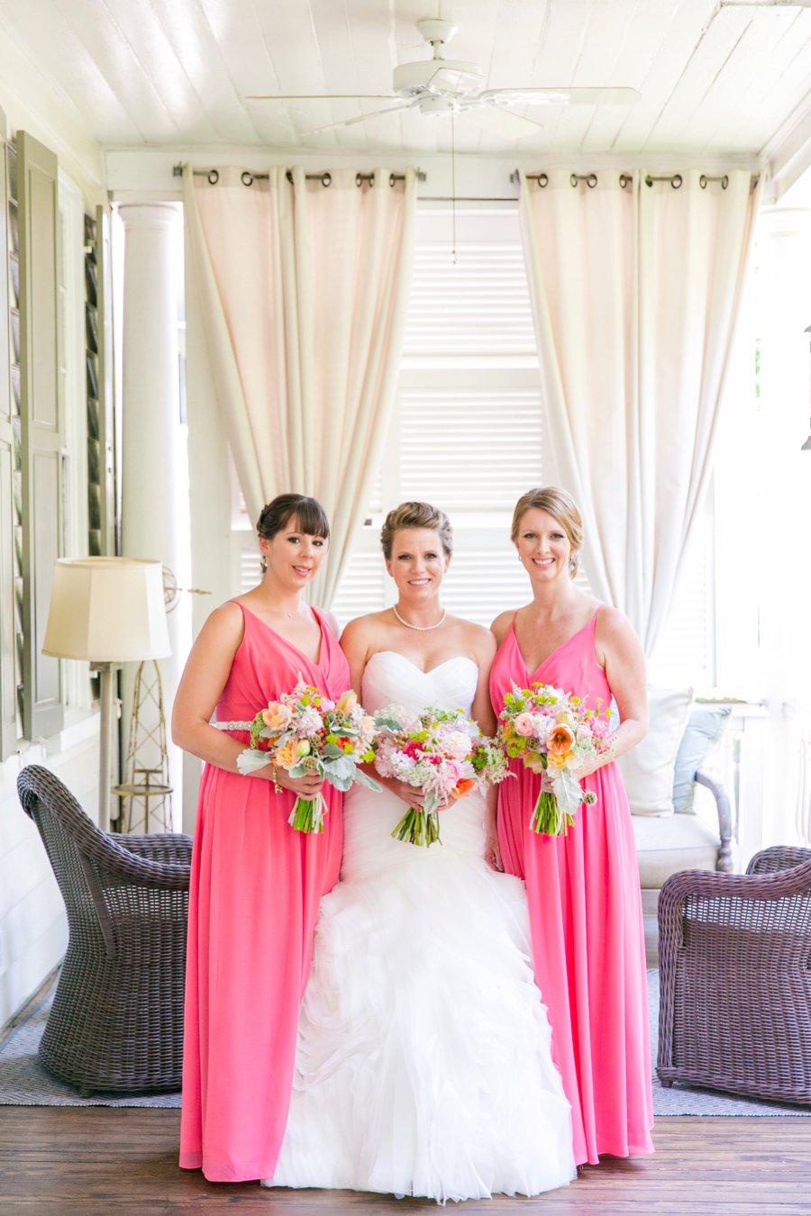 A Pink, Orange, & White Intimate Charleston Destination Wedding via TheELD.com