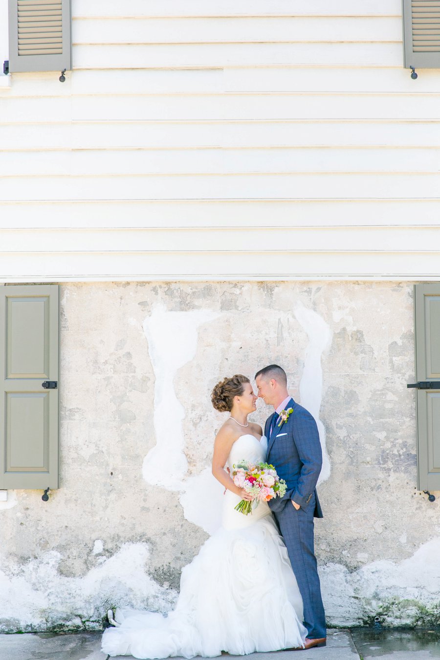 A Pink, Orange, & White Intimate Charleston Destination Wedding via TheELD.com