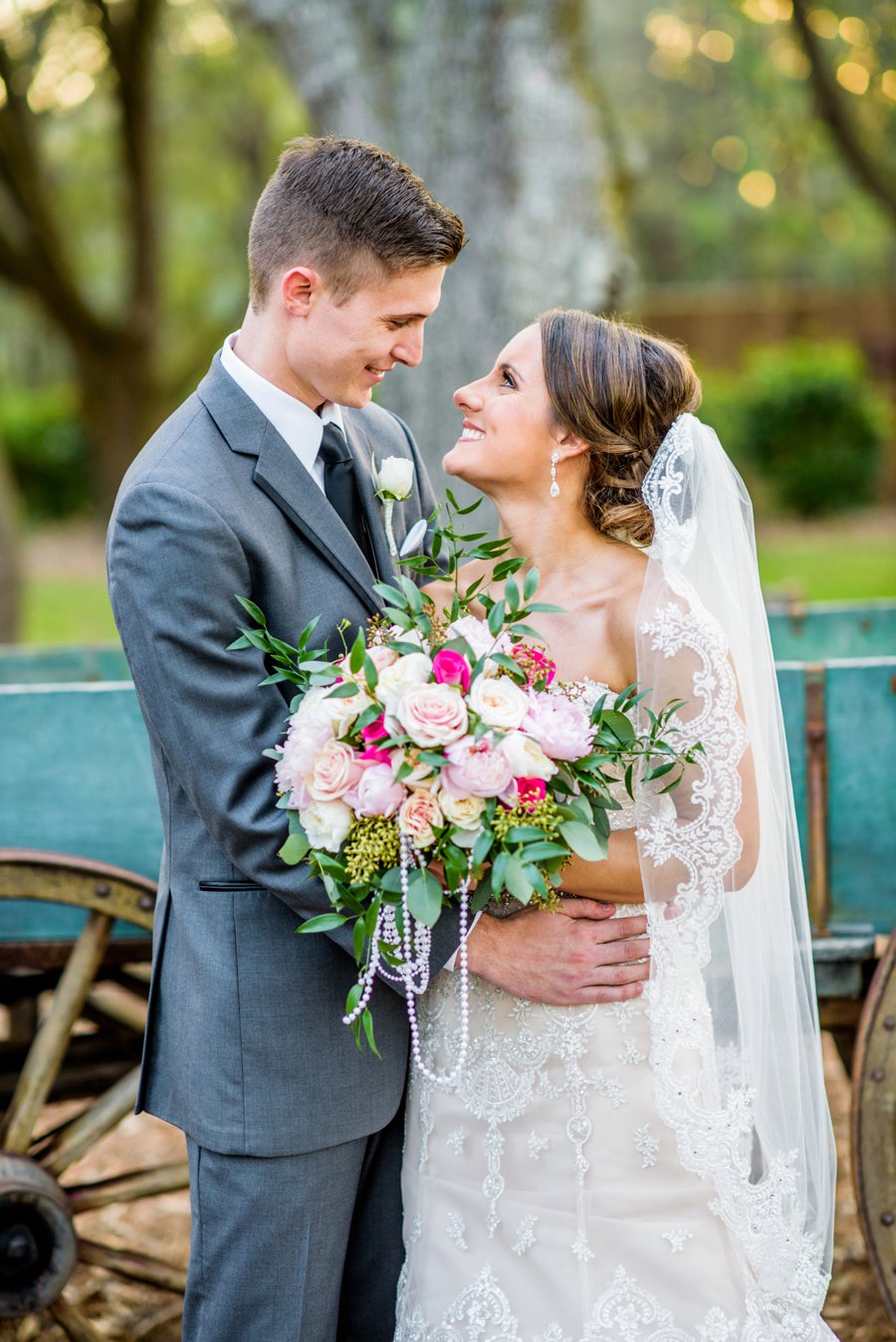 A Pink and Teal Rustic Florida Wedding via TheELD.com