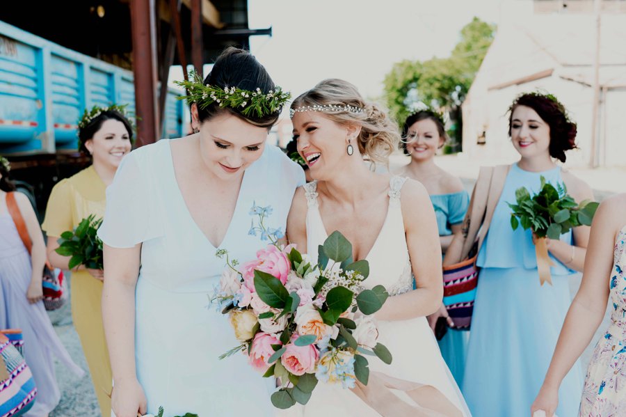 A Colorful Floral inspired Industrial Dallas Wedding via TheELD.com