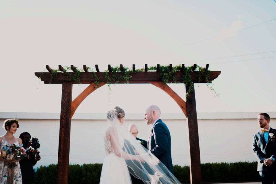 A Colorful Floral inspired Industrial Dallas Wedding via TheELD.com