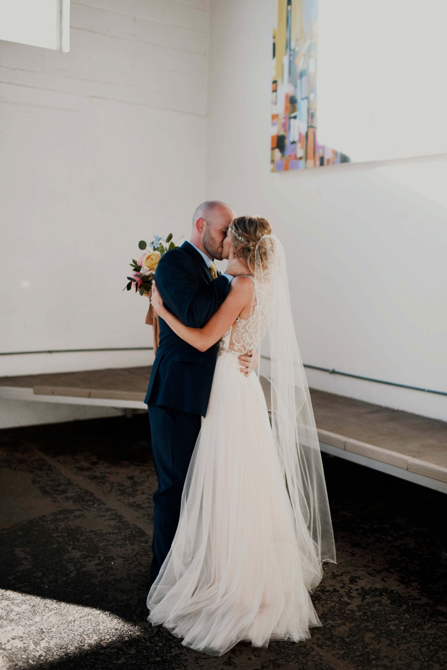 A Colorful Floral inspired Industrial Dallas Wedding via TheELD.com