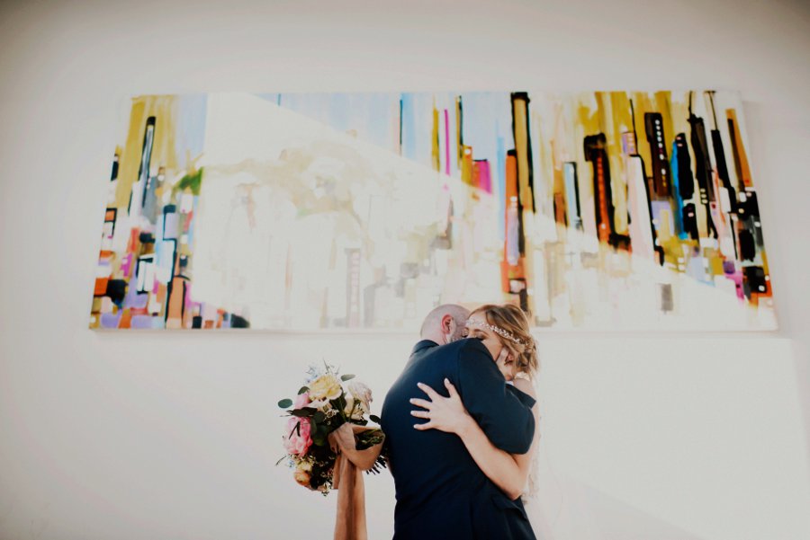 A Colorful Floral inspired Industrial Dallas Wedding via TheELD.com