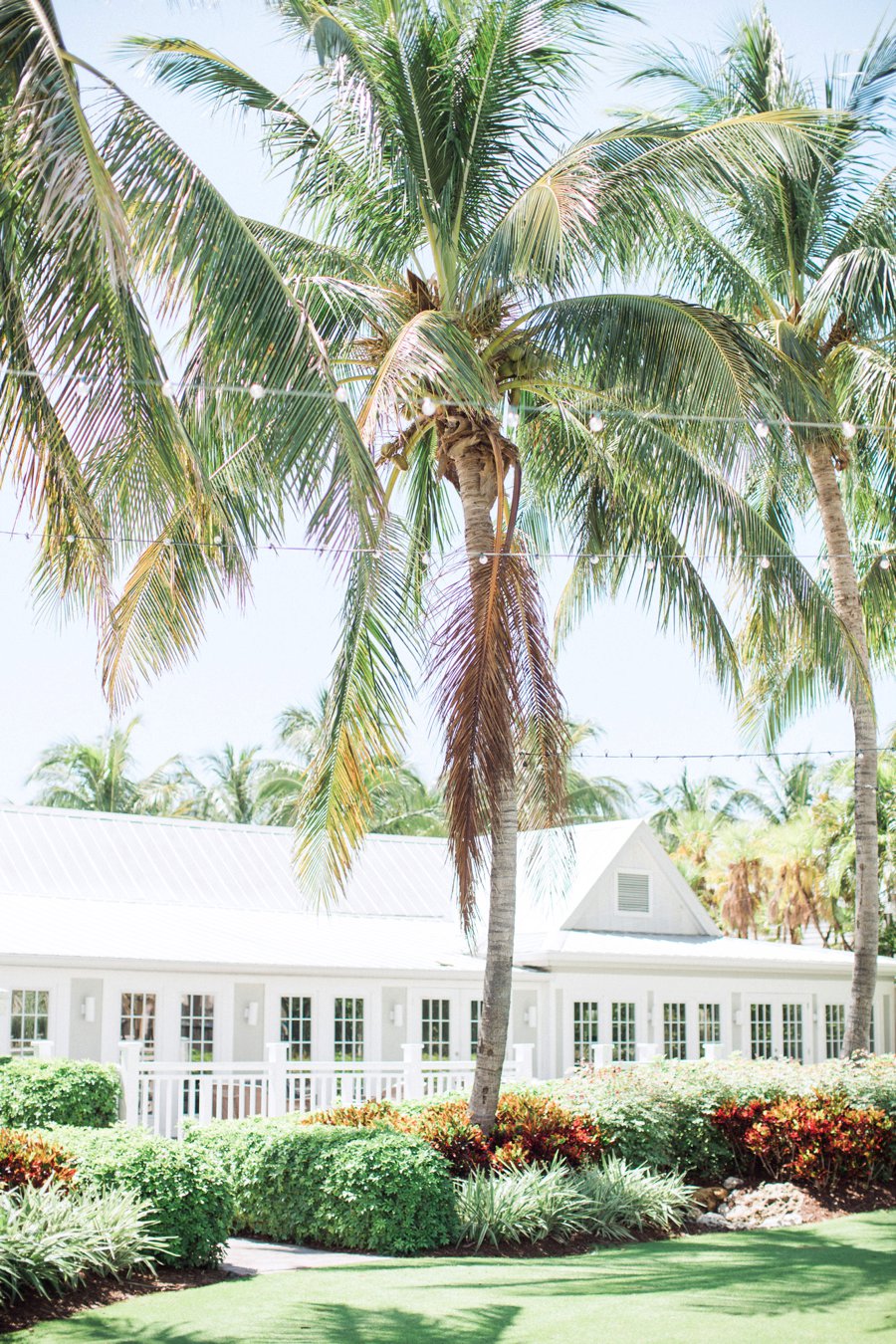 A Romantic Purple & Red Captiva Island Wedding via TheELD.com