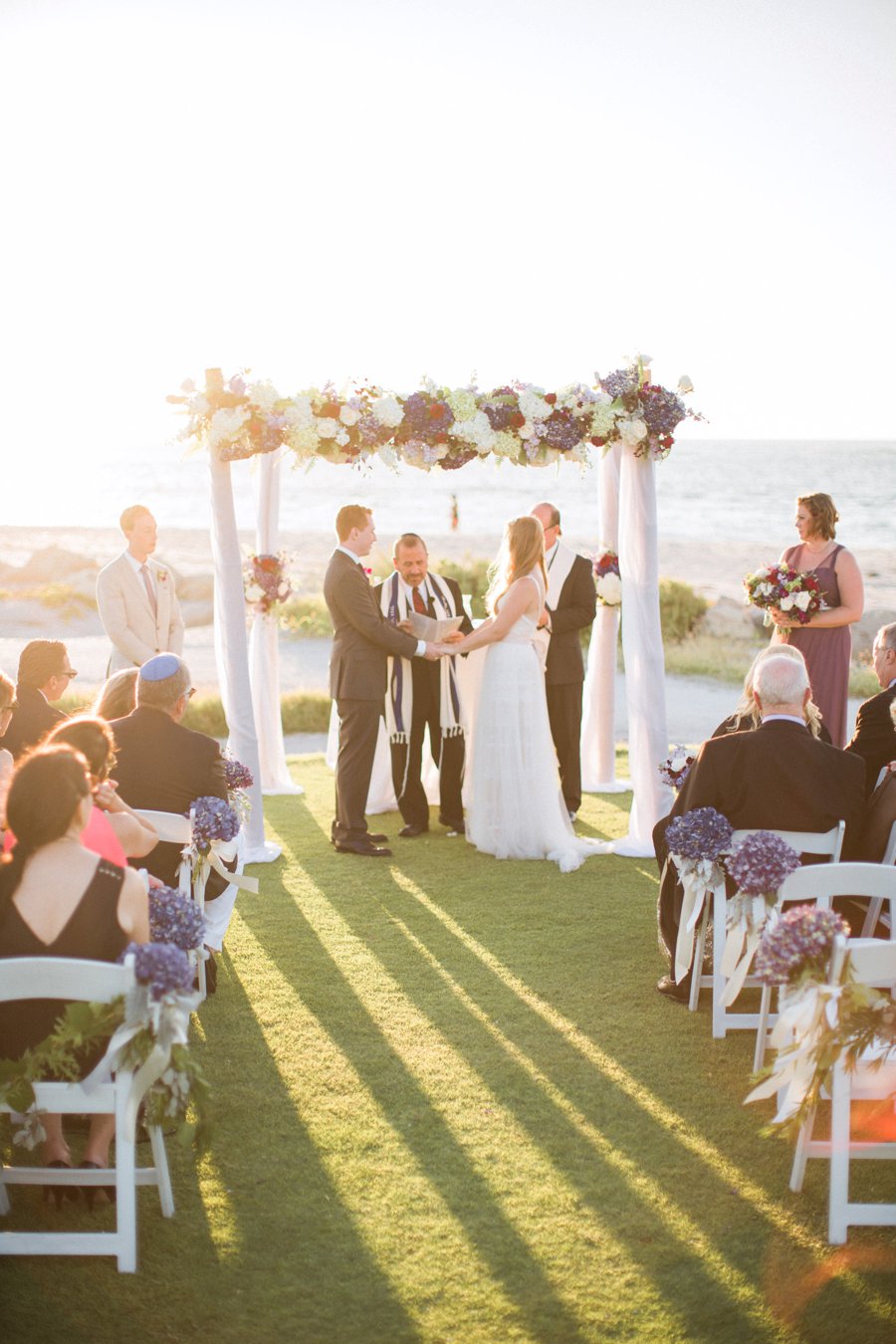 A Romantic Purple & Red Captiva Island Wedding via TheELD.com