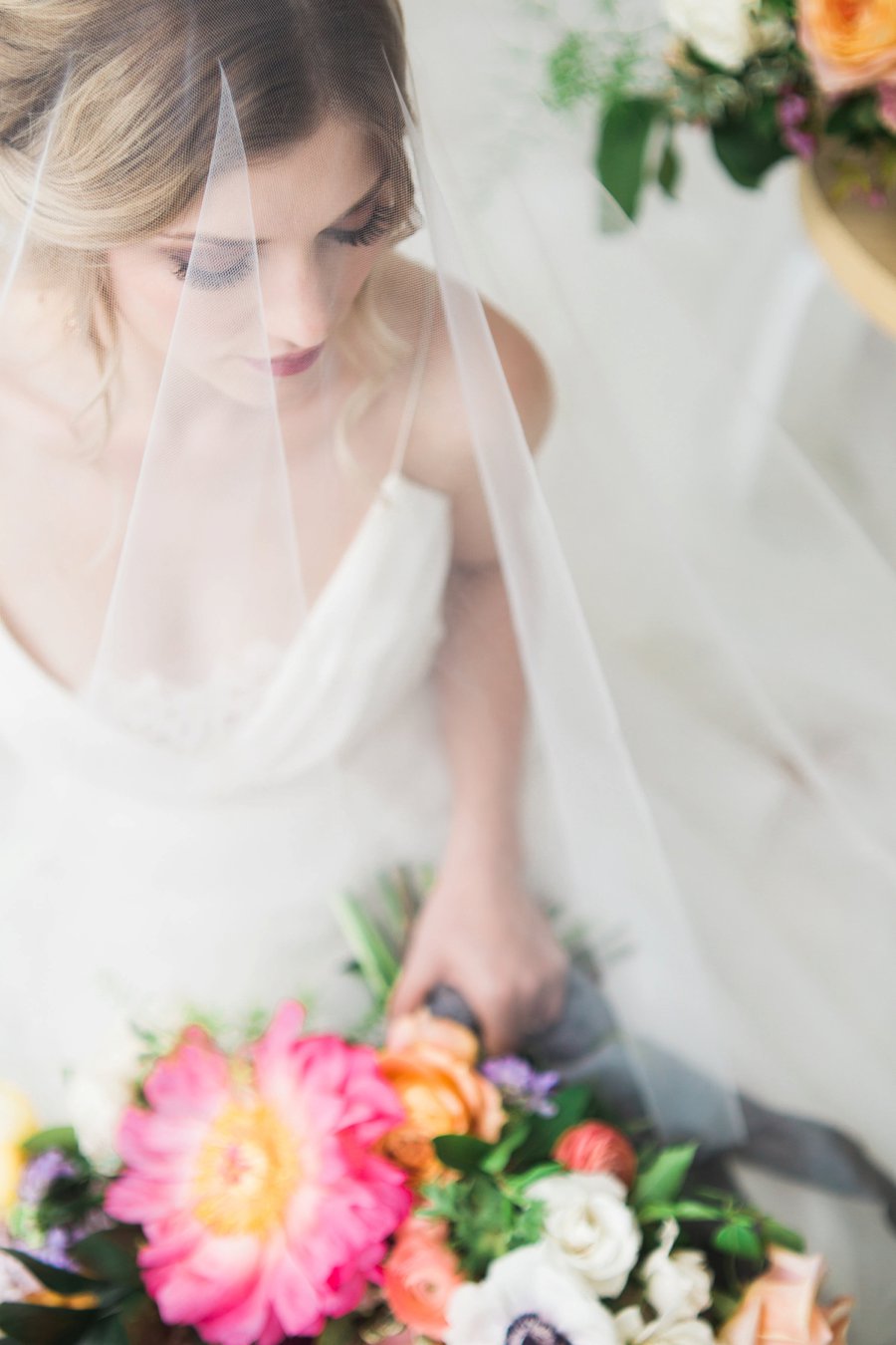 Colorful Coral & Peach Floral Wedding Inspiration via TheELD.com