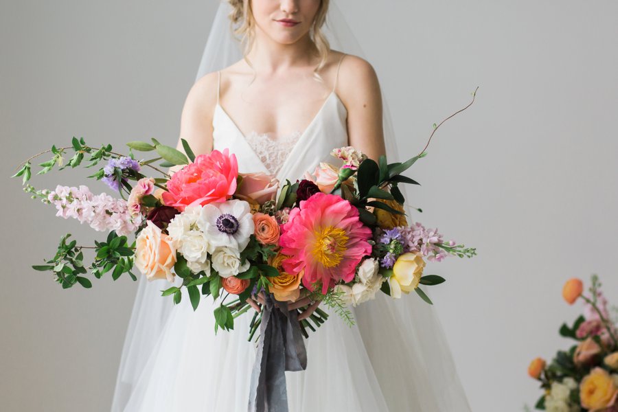 Colorful Coral & Peach Floral Wedding Inspiration via TheELD.com