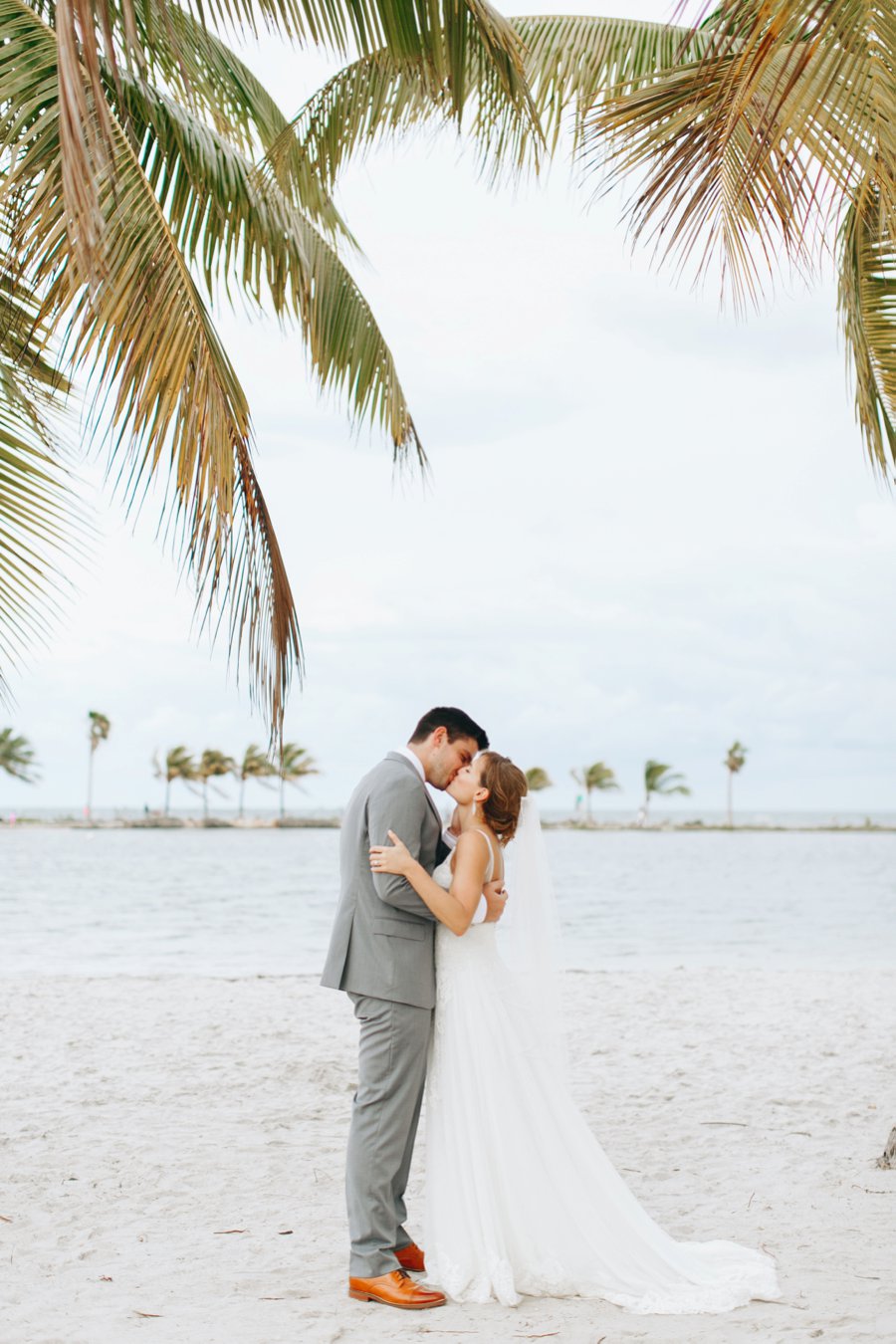 A Romantic Green & White Oceanside Miami Wedding via TheELD.com