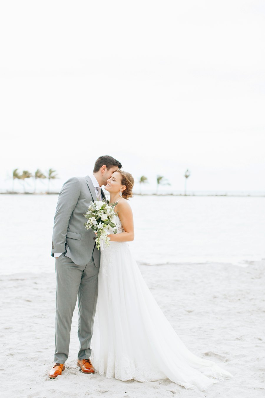 A Romantic Green & White Oceanside Miami Wedding via TheELD.com