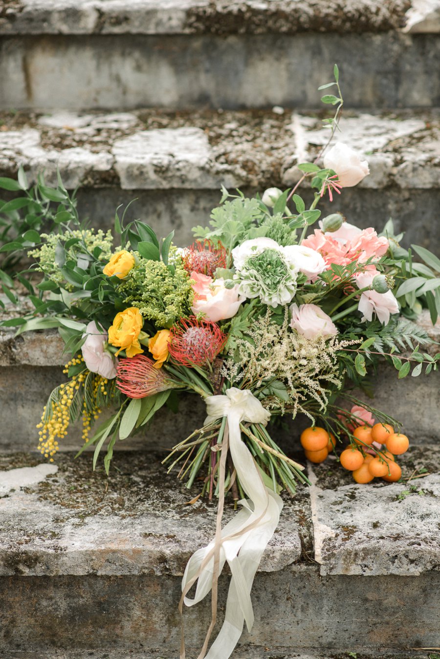 Peach, Yellow, and Green Tropical Wedding Ideas via TheELD.com