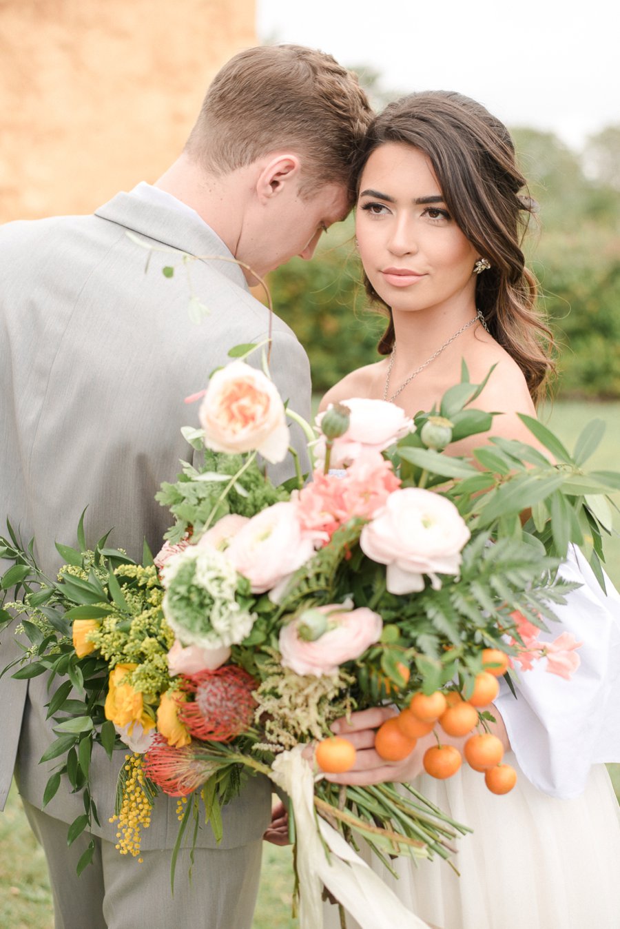 Peach, Yellow, and Green Tropical Wedding Ideas via TheELD.com