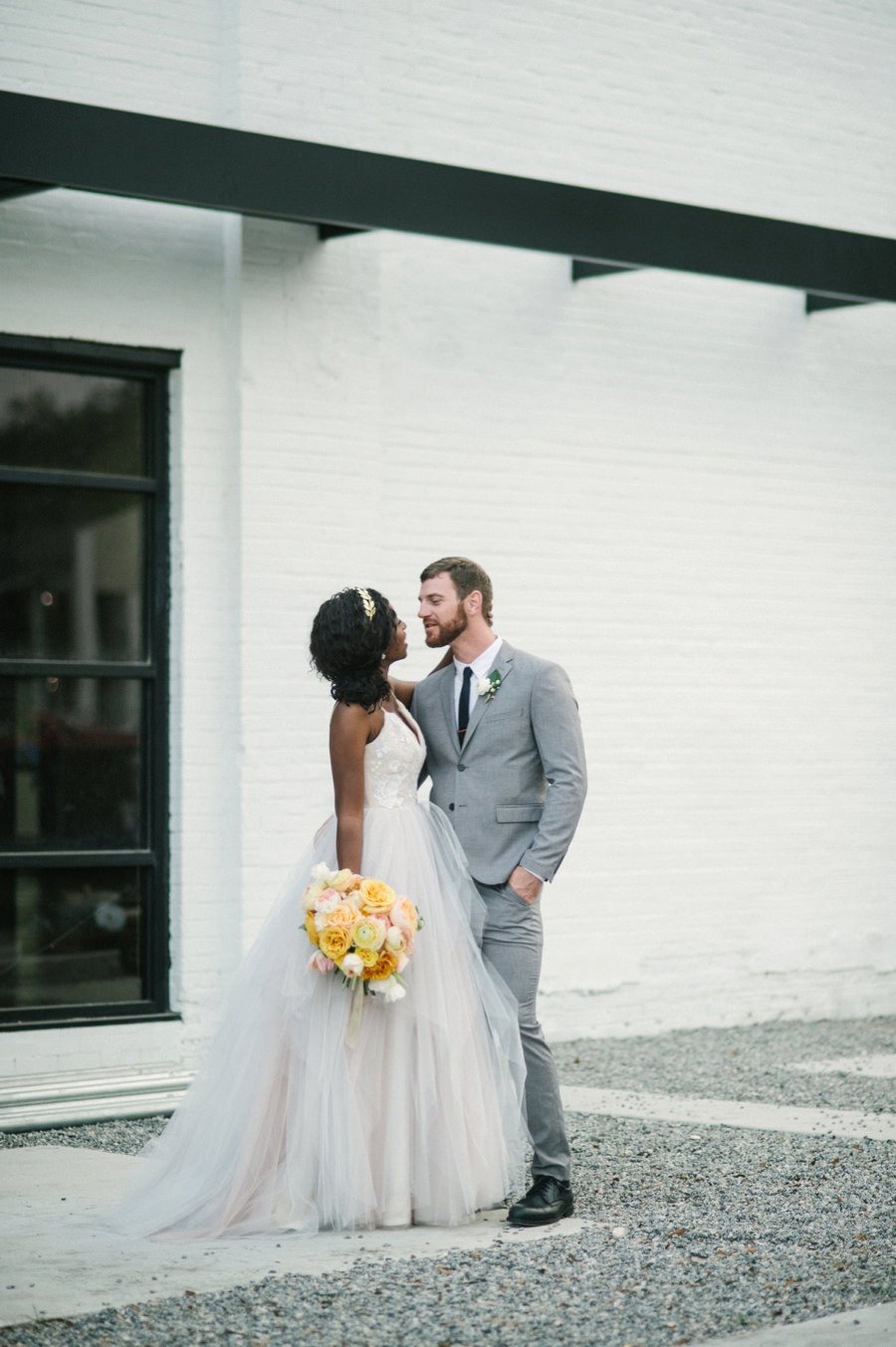 Romantic Peach & Yellow Industrial Wedding Ideas via TheELD.com