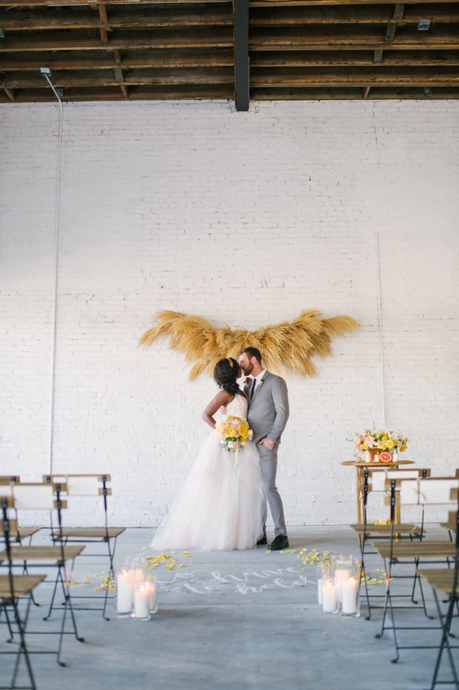 Romantic Peach & Yellow Industrial Wedding Ideas via TheELD.com