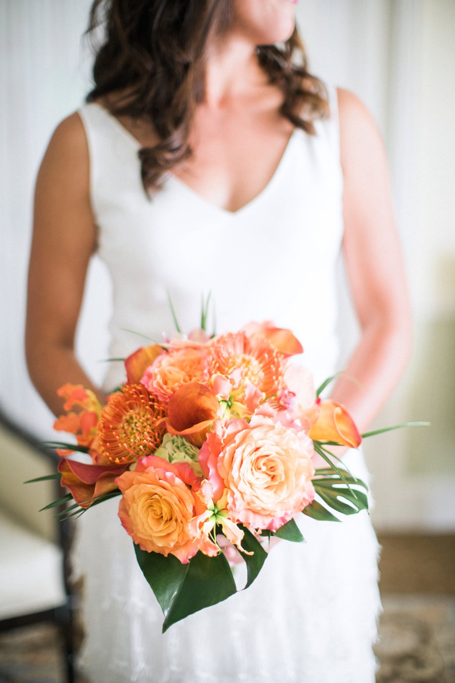 A Tropical Orange & Green Florida Destination Wedding via TheELD.com