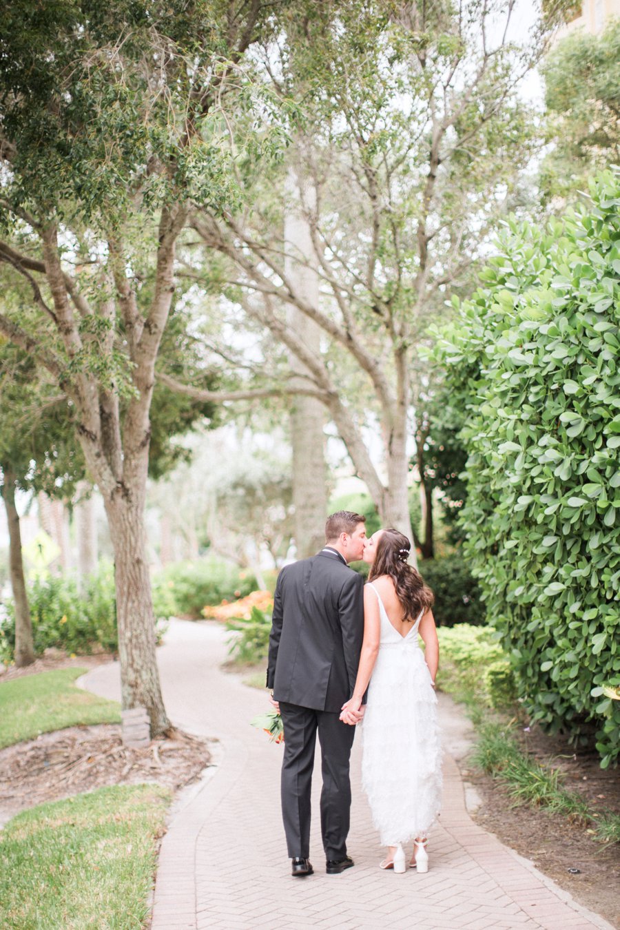 A Tropical Orange & Green Florida Destination Wedding via TheELD.com