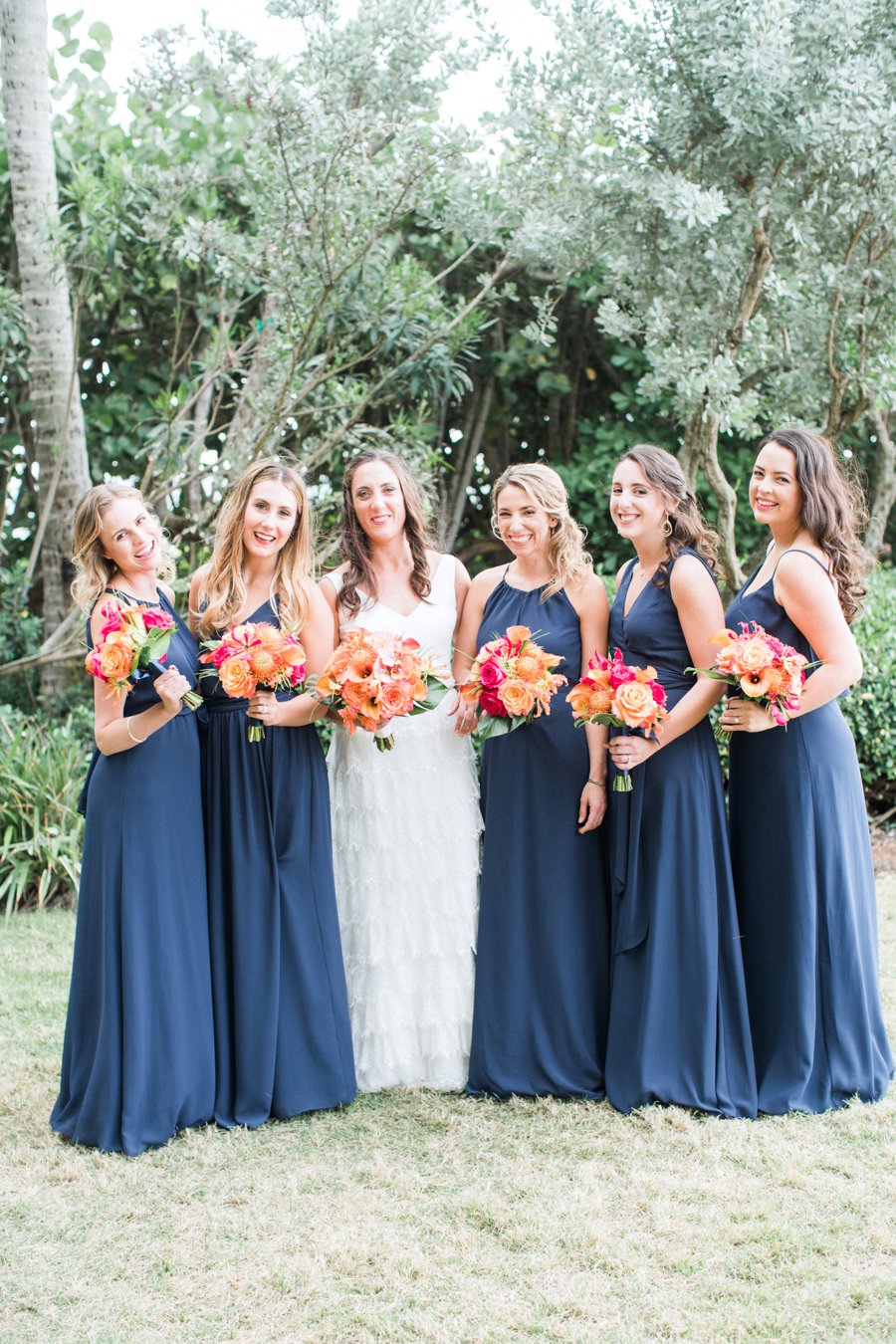 A Tropical Orange & Green Florida Destination Wedding via TheELD.com