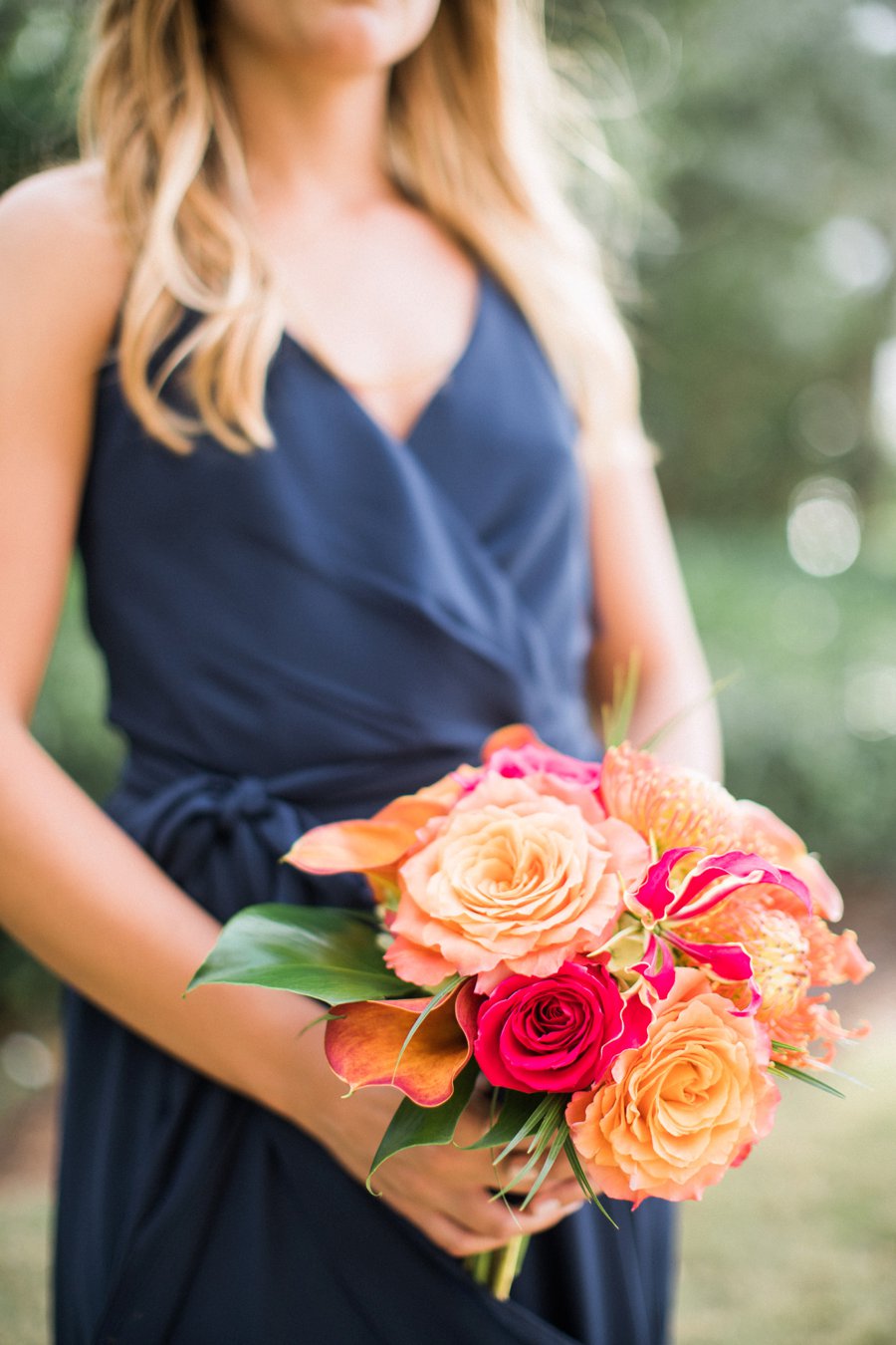 A Tropical Orange & Green Florida Destination Wedding via TheELD.com