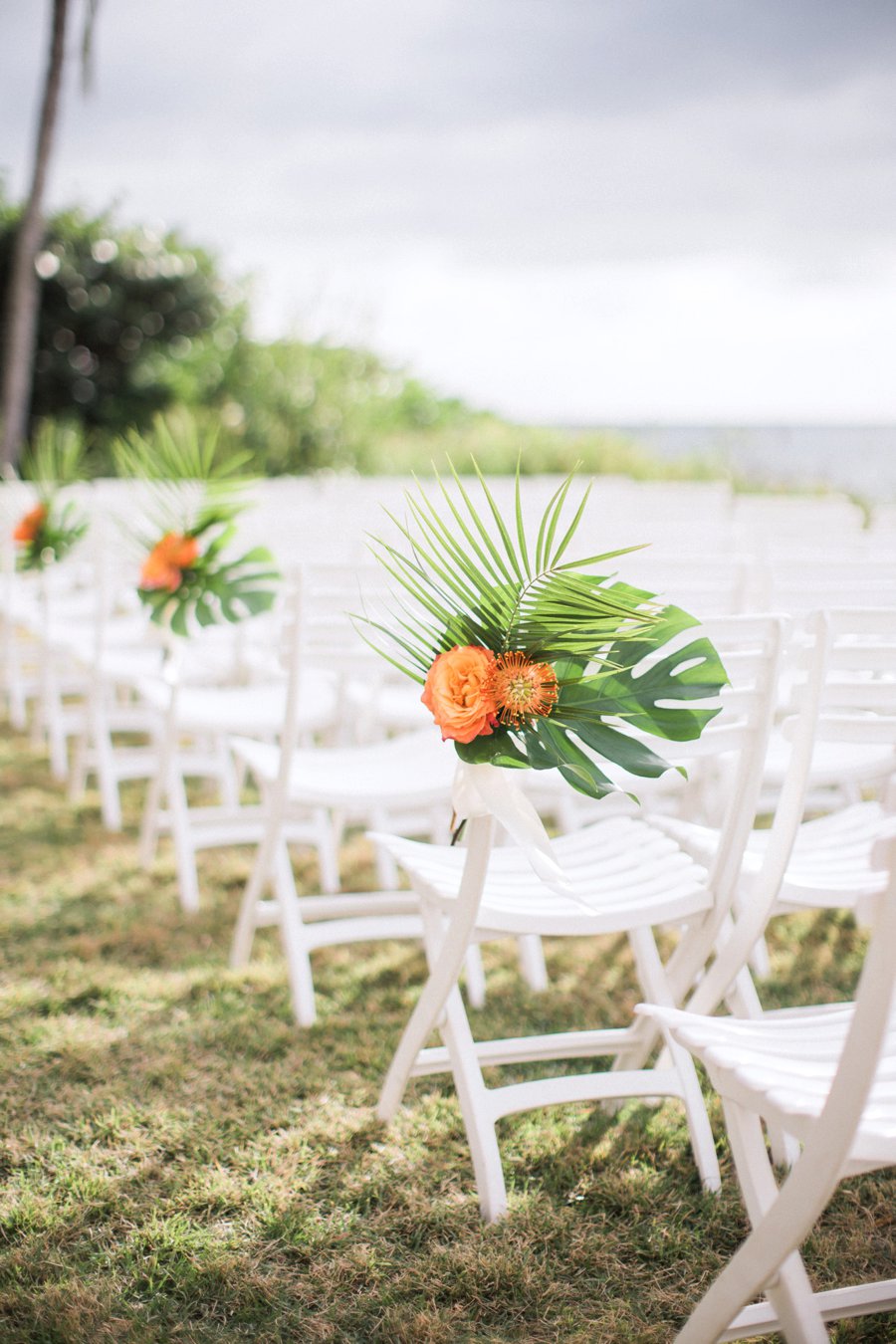 A Tropical Orange & Green Florida Destination Wedding via TheELD.com