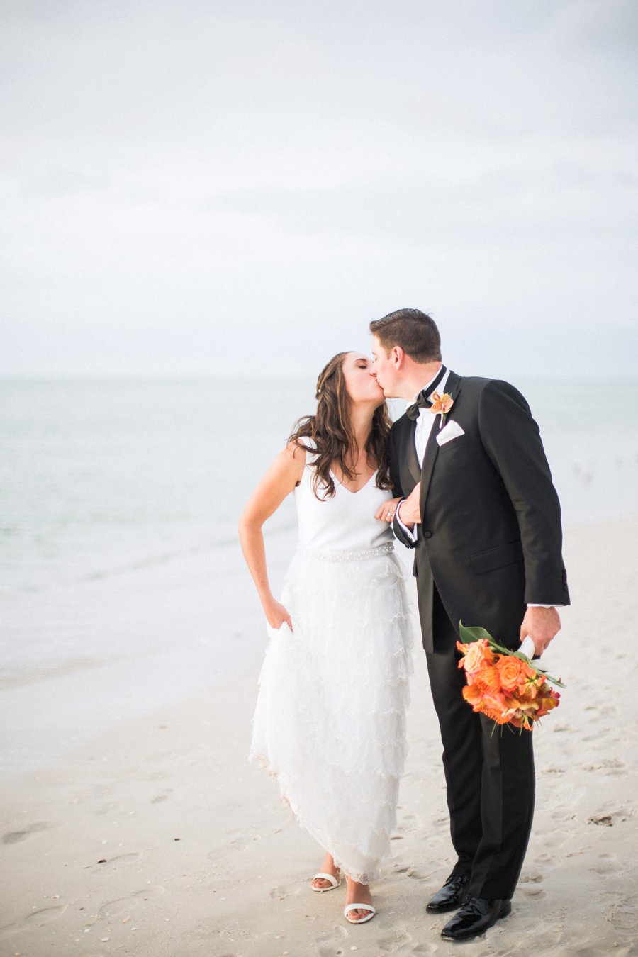 A Tropical Orange & Green Florida Destination Wedding via TheELD.com