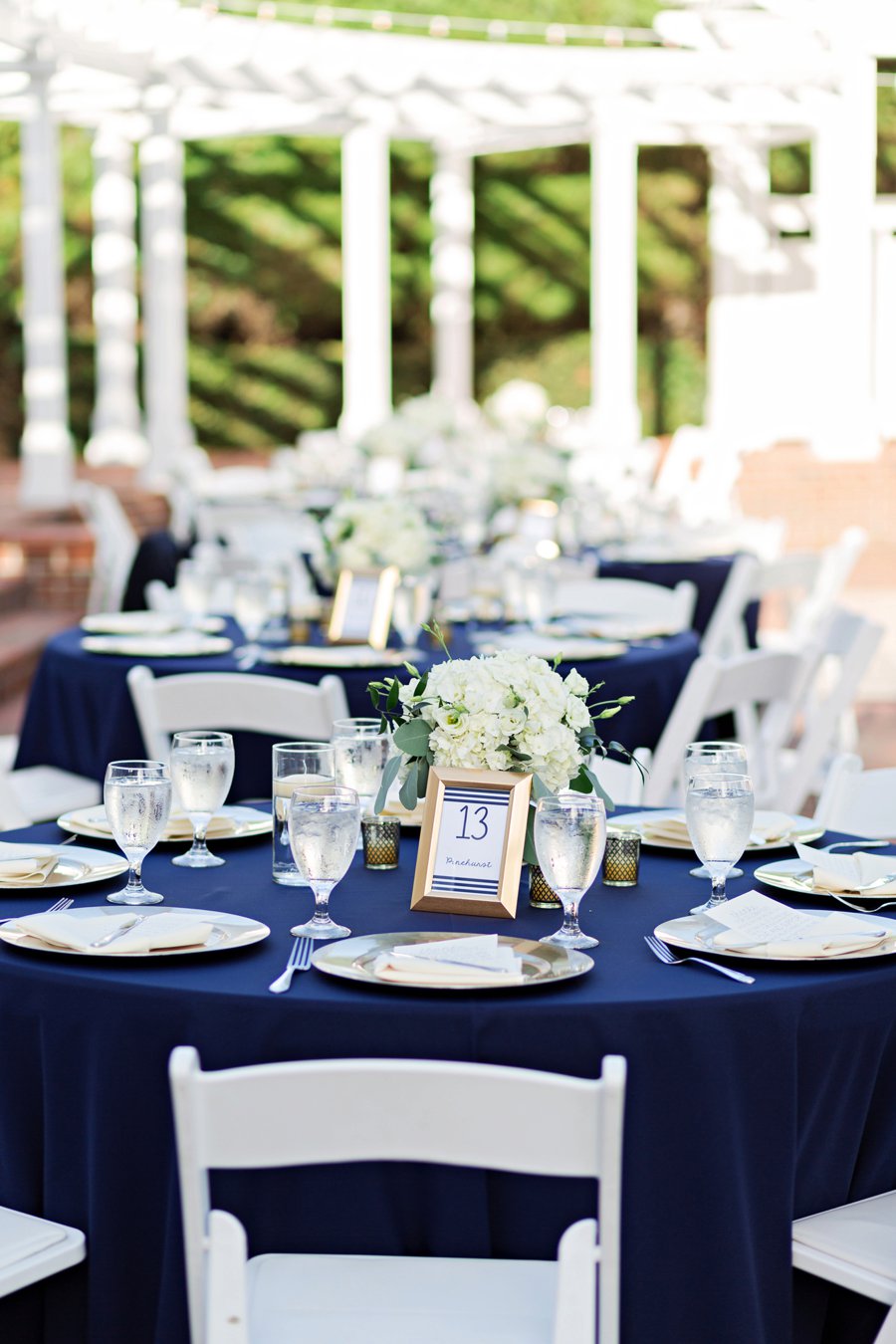 A Classic Navy & White Outdoor Florida Wedding via TheELD.com