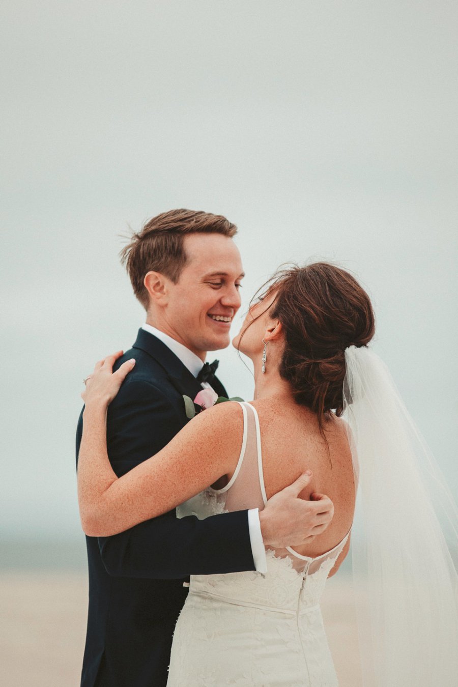 An Elegant Blush & Red Oceanfront Wedding via TheELD.com