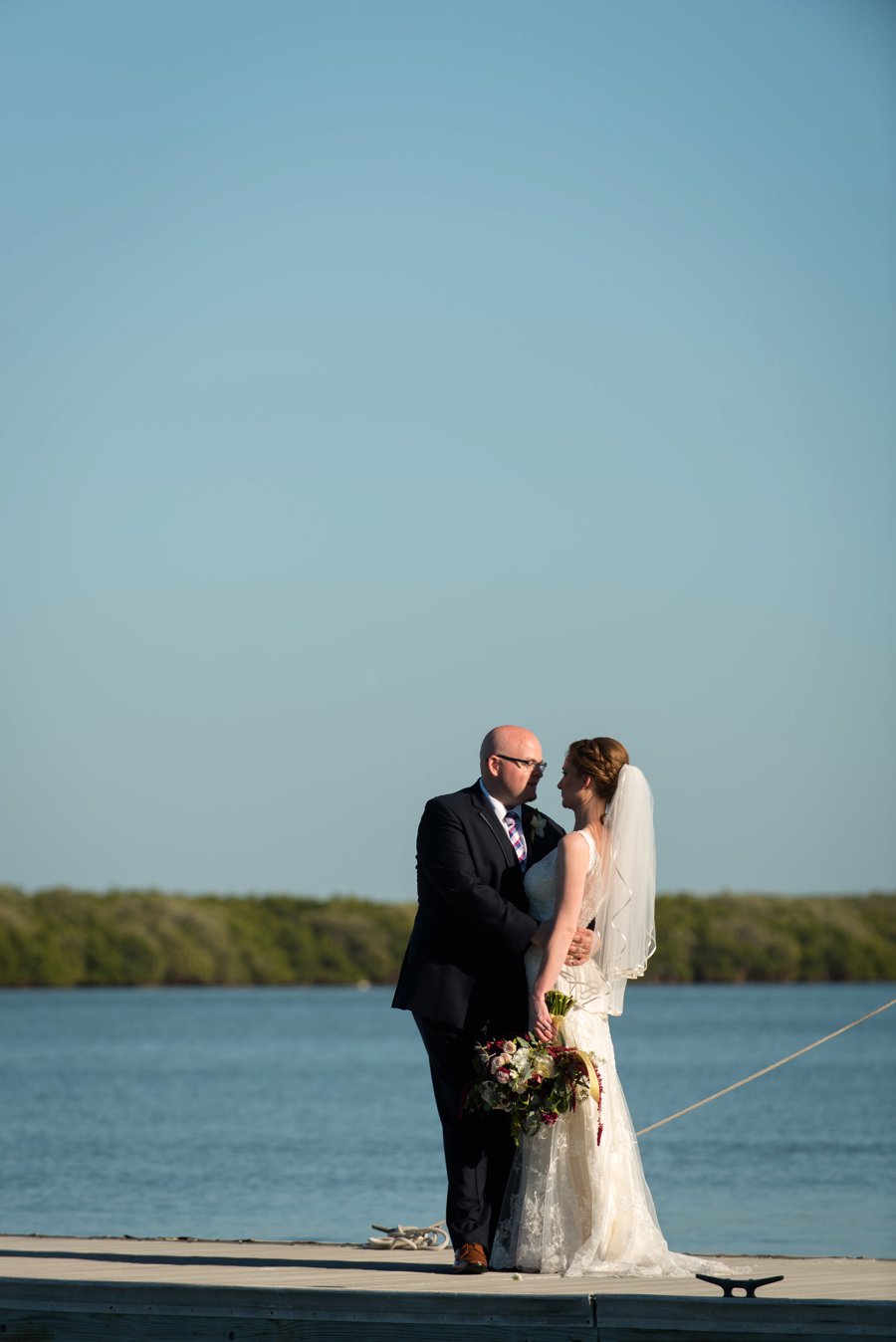 A Burgundy & Navy Florida Beach Wedding via TheELD.com