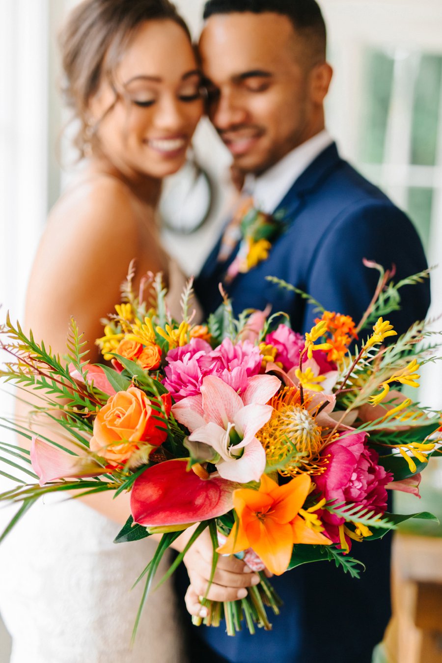 Colorful & Elegant Tropical Wedding Ideas via TheELD.com