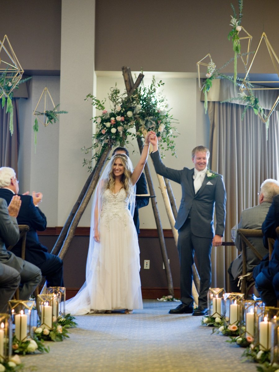 A Peach & Green Boho Ballroom Wedding via TheELD.com