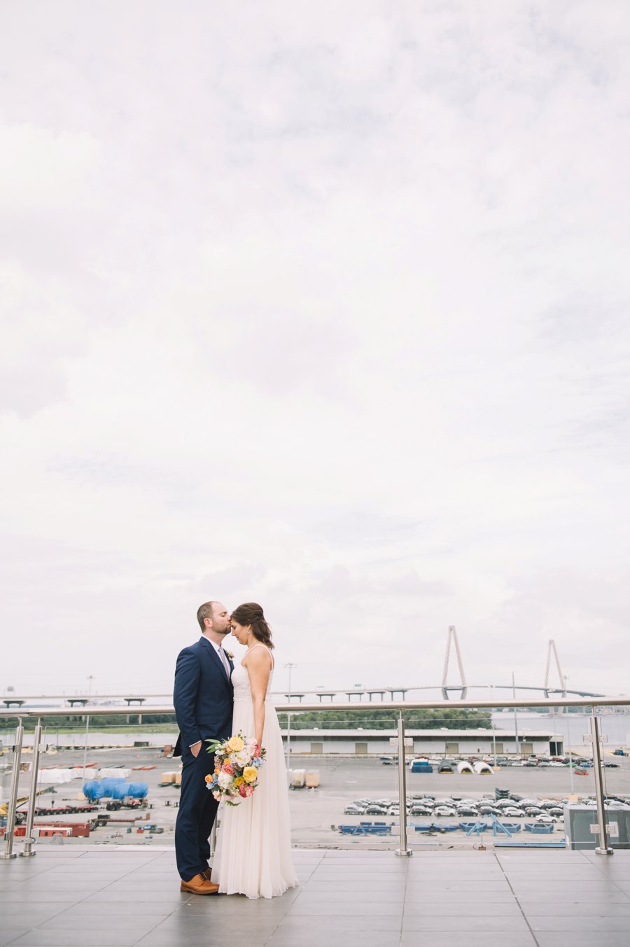 An Elegant Industrial Yellow, Grey, & Blue Charleston Wedding via TheELD.com