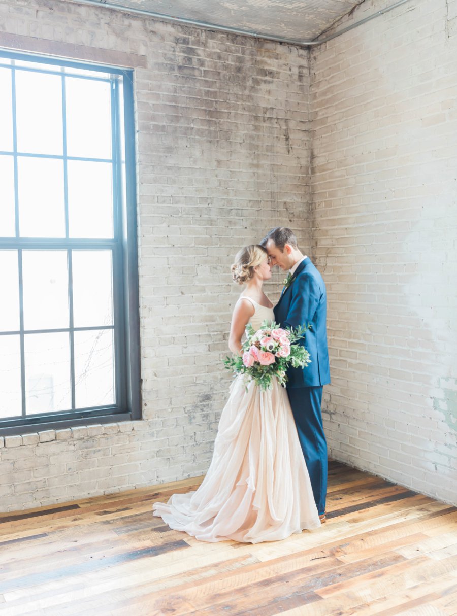 A Blush & Navy Rustic Industrial Michigan Wedding via TheELD.com