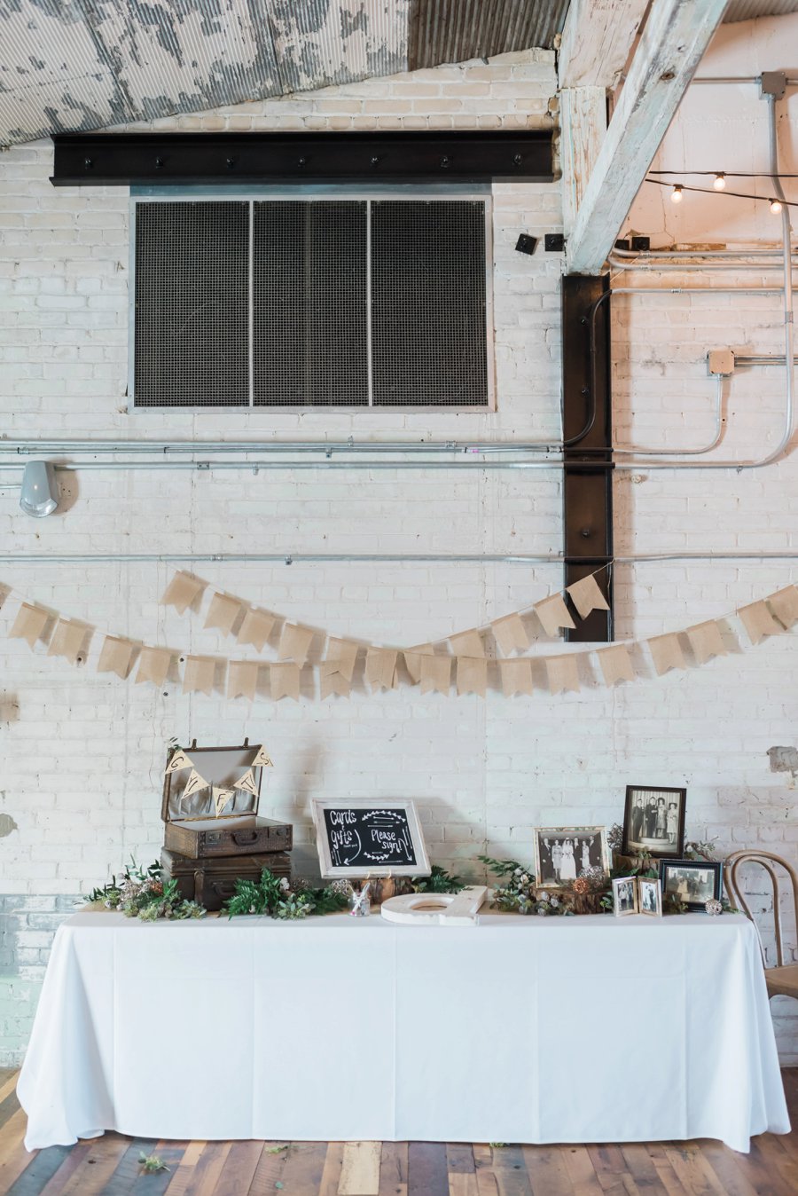 A Blush & Navy Rustic Industrial Michigan Wedding via TheELD.com