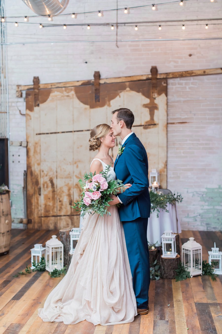 A Blush & Navy Rustic Industrial Michigan Wedding via TheELD.com