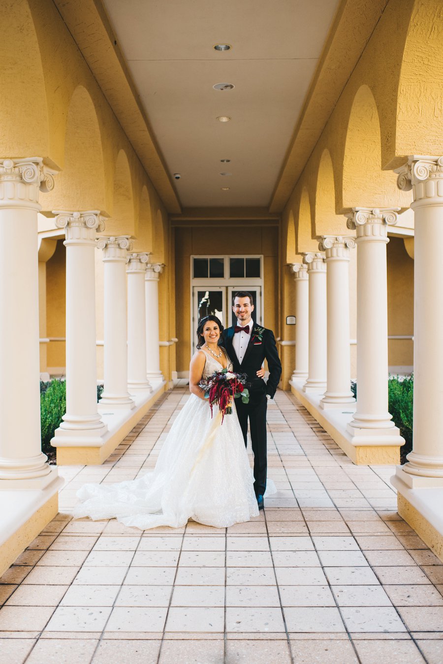 An Elegant Burgundy and Navy Fairytale Orlando Wedding Day via TheELD.com