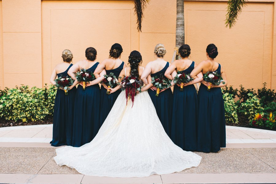 An Elegant Burgundy and Navy Fairytale Orlando Wedding Day via TheELD.com