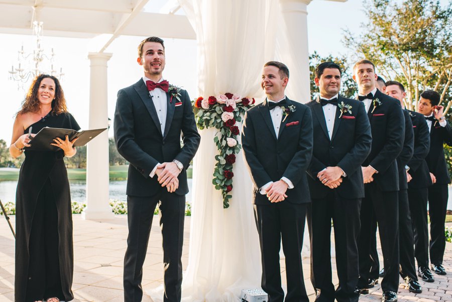 An Elegant Burgundy and Navy Fairytale Orlando Wedding Day via TheELD.com